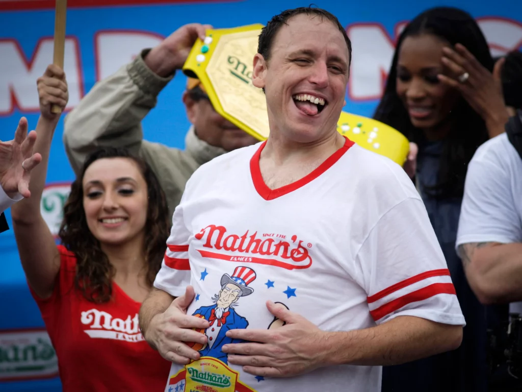 Not Seen on TV Joey Chestnut Catches Protester in Chokehold During Hot