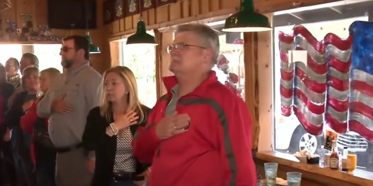 restaurant owner woke national anthem