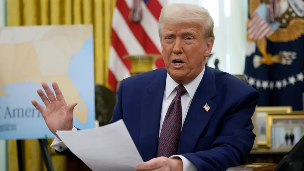 trump with hand up
