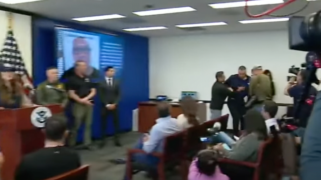 confrontation at kristi noem press conference