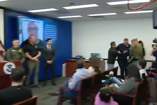 confrontation at kristi noem press conference