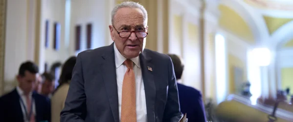 chuck schumer with glasses on