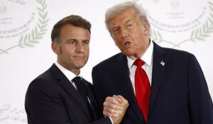 Watch Trump and Macron Bond For Marathon Handshake