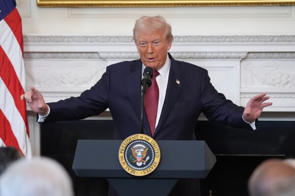 trump arms out