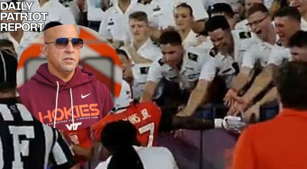 virginia tech college football coach high fiving cadets